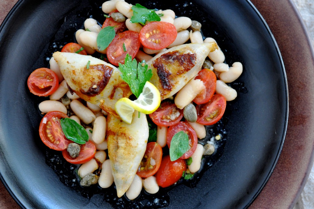 Marinated white beans salad with: cherry tomato, oregano, lemon juice, garlic, and parsley