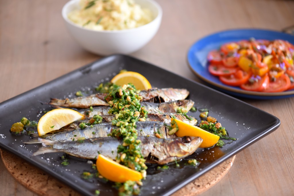 Grilled sardines with ms. glaze's green sauce